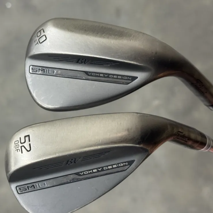 Pair of Raw Vokey SM10 Wedges 60-04T and 52-08F w/ AMT R300 Shafts and